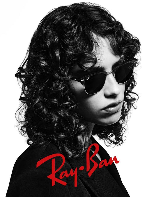 black and white photo of beautiful women wearing ray-ban clubmaster sunglasses