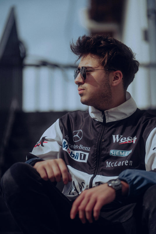 car race driver with sunglasses, showcasing the comfort and clarity provided by the sunglasses on a sunny day